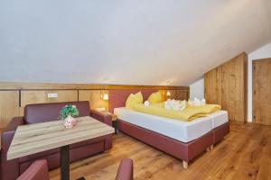 Posteľ alebo postele v izbe v ubytovaní Appartement Loser mit Indoorpool und Sauna
