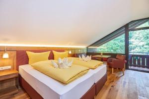 Posteľ alebo postele v izbe v ubytovaní Appartement Loser mit Indoorpool und Sauna