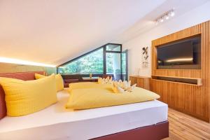 Televízia a/alebo spoločenská miestnosť v ubytovaní Appartement Loser mit Indoorpool und Sauna