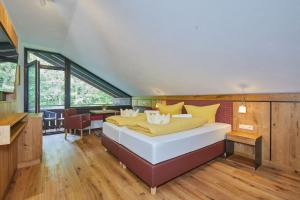 Posteľ alebo postele v izbe v ubytovaní Appartement Loser mit Indoorpool und Sauna