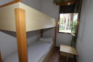 Postel nebo postele na pokoji v ubytování Residences La Rustica & Elite + 37 fotografií
