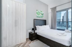 Postel nebo postele na pokoji v ubytování Group Stay I Near Dubai Mall I Family friendly + 25 fotografií
