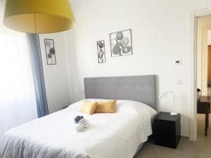 Postel nebo postele na pokoji v ubytování Enjoy Pisa