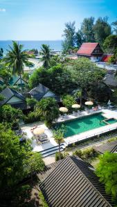 an aerial view of a resort with a swimming pool at Oasis Yoga Bungalows in Ko Lanta
