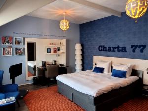 Postel nebo postele na pokoji v ubytování Hotel de Wereld