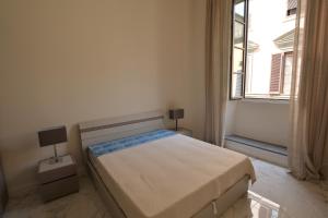 Säng eller sängar i ett rum på Servi Luxury apartment