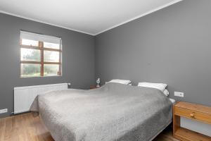Postel nebo postele na pokoji v ubytování Modern 2BR House in Mosfellsbær