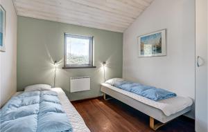 Postel nebo postele na pokoji v ubytování Holiday Home Øer Højden Denm