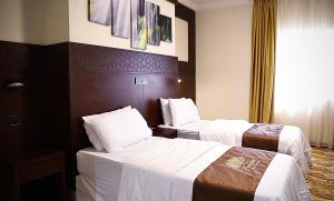 Fotografie z fotogalerie ubytování فندق الفجر البديع واحد للخدمات الفندقيه v destinaci Al Khansāk