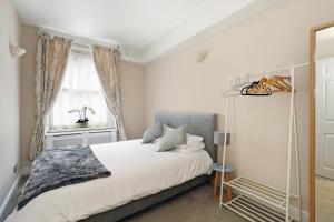 Krevet ili kreveti u jedinici u okviru objekta Covent Garden Superior Two Bedroom Aparment on Strand