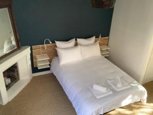 Postel nebo postele na pokoji v ubytování Maison Angouleme, France