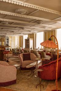 Château des Fleurs Hôtel & Spa Paris的休息区