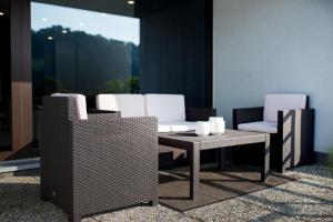 a group of chairs and a table and a chair at KELLER APARTMENT in Sulz am Neckar