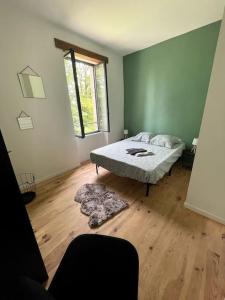 Postel nebo postele na pokoji v ubytování Superbe appartement cosy avec jardin