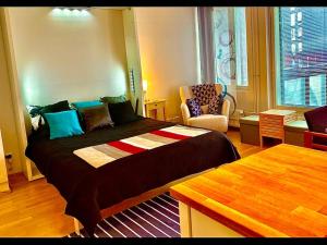 a bedroom with a large bed in a room at To LuxStudio KARNEOLI From Helsinki Airport 6 min, to City 27min, Free Parking in Kivistö in Vantaa