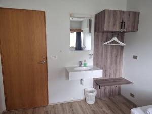 Koupelna v ubytování Litla-Hof Guesthouse