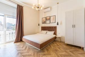 Katil atau katil-katil dalam bilik di Idea Design Apart-Hotel Chykalenka