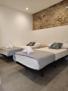 Кровать или кровати в номере Pensión SP 55 by Bossh! Hotels