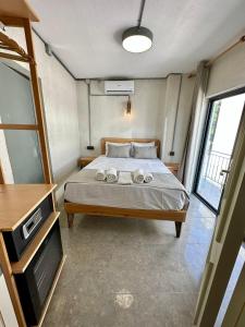 a bedroom with a bed with two towels on it at Elegance House Hotel in Istanbul