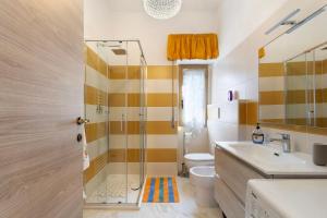 a bathroom with a shower and a sink and a toilet at Ca' Lina in Licciana Nardi +21 photos