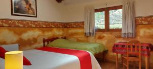 Postel nebo postele na pokoji v ubytování Tradicion Colca
