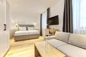 Ένα ή περισσότερα κρεβάτια σε δωμάτιο στο Hotel Gasthof König