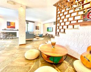 A seating area at Villa Naya by the Beach