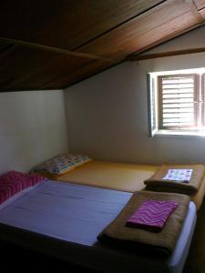 Posteľ alebo postele v izbe v ubytovaní Holiday Home Luznar