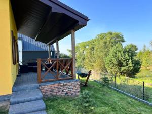 Vonkajšia záhrada v ubytovaní Brzozowe Wzgórze z jacuzzi i rowerami + 9 fotografií