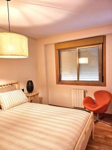 Ένα ή περισσότερα κρεβάτια σε δωμάτιο στο apartamentcastrotuy +5 φωτογραφίες