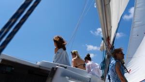 a group of people standing on a sailboat at Palazzo Zacà in Gallipoli