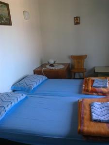 מיטה או מיטות בחדר ב-Holiday Home Luznar
