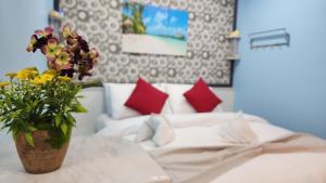 Postel nebo postele na pokoji v ubytování Isle Inn Guesthouse + 37 fotografií