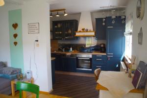 Kuchyň nebo kuchyňský kout v ubytování Ferienhaus Zwickelreith + 28 fotografií