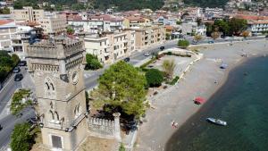 an aerial view of a city with a clock tower at Casa Franiti - Sul Mare in Sapri