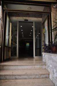 an entrance to a building with glass doors at Biter Hotel in Istanbul