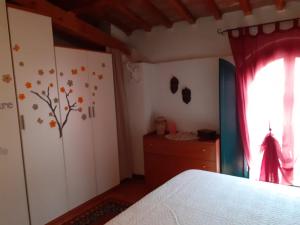 Voodi või voodid majutusasutuse Casa di nonno Gio toas