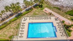 an overhead view of a swimming pool at a resort at Destin on the Gulf 703 - Gulf Front Property 7th Floor in Destin