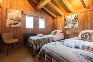 Postel nebo postele na pokoji v ubytování Megève - Chalet Miage + 37 fotografií