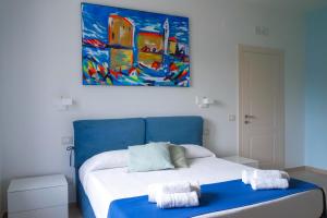 Postel nebo postele na pokoji v ubytování Biancolivo Country House