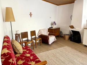 a living room with a couch and a chair at Cozy 3-BR Getaway, Lama de Arcos by LovelyStay 
