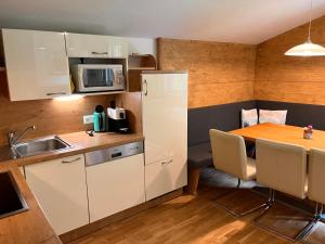 Küche/Küchenzeile in der Unterkunft Montanara Apartment & Zimmer
