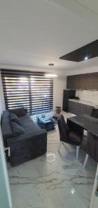 Predel za sedenje v nastanitvi ITACA apartman Krupanj