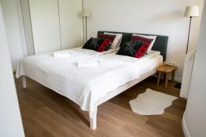Posteľ alebo postele v izbe v ubytovaní Apartamenty Tatrzańskie Turnie Krupówki