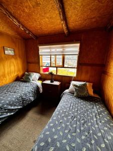 Cama o camas de una habitación en Ruta 7 Coffee & Lodging