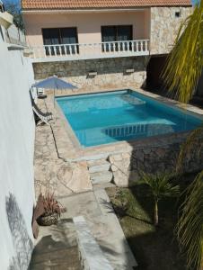 a swimming pool in the backyard of a house at casa de campo Angel in Tehuacán