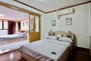 Fotografie z fotogalerie ubytování 曼谷市中心/Thong Lor/Ekkamai/小区联排别墅 v destinaci Bangkok