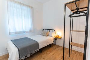 Postel nebo postele na pokoji v ubytování Casa Jade, La Palma