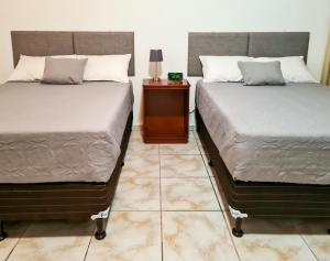 Voodi või voodid majutusasutuse Helechos Hotel toas