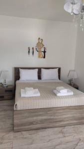 Posteľ alebo postele v izbe v ubytovaní Ioanna Apartment 1